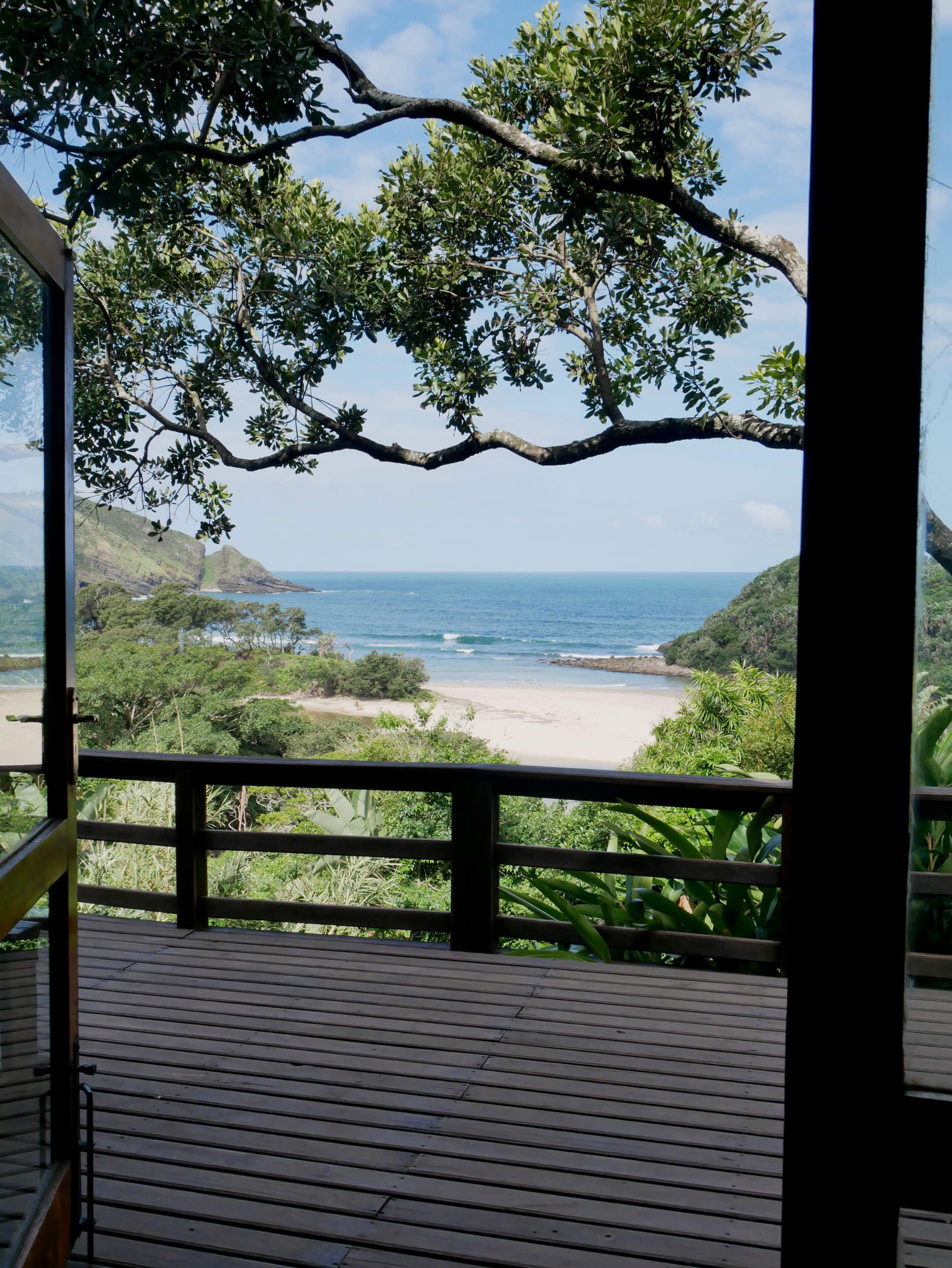 Large deck with mountain and ocean views