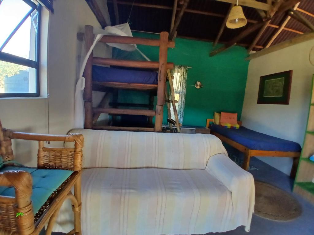 Bedroom with single bed and bunk bed